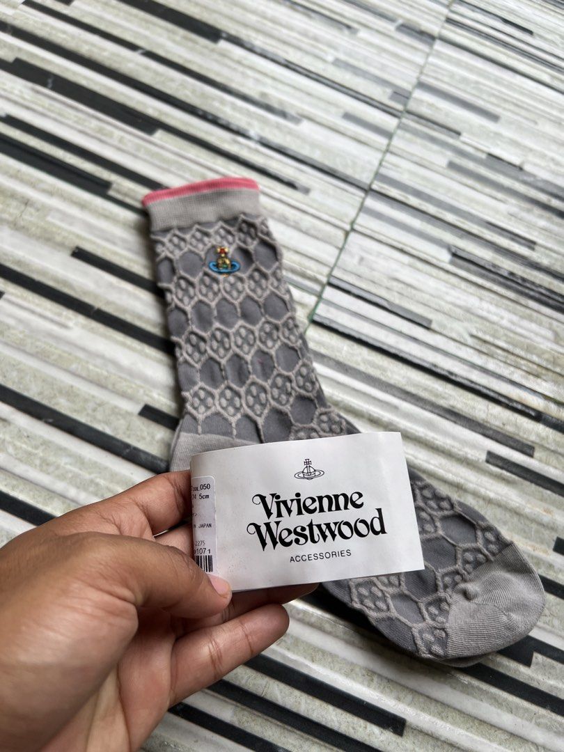 Vivienne Westwood Logo Pattern Grey Socks (Category: Socks & Tights) located in Iba. Submitted by saploot (Listing ID 1466478855, Image 2). Description: .