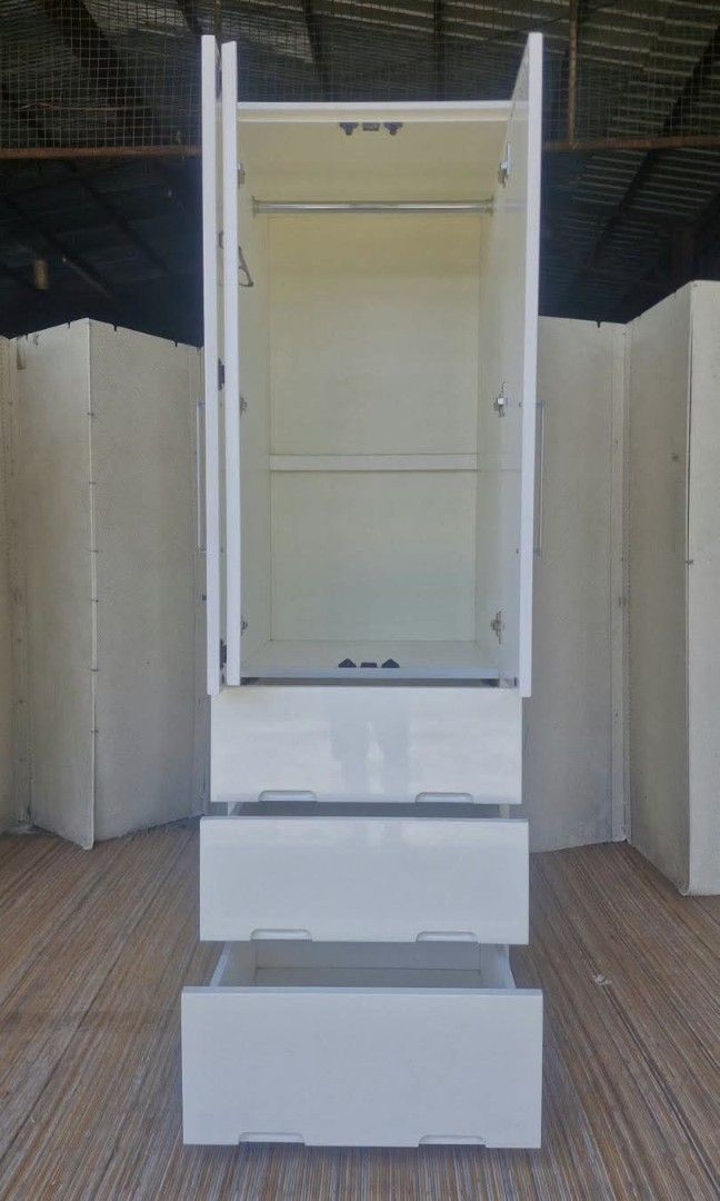 Wardrobe (Category: Shelves, Cabinets & Racks) located in Meycauayan. Submitted by marygracecasimiro (Listing ID 1466484569, Image 3). Description: Slim Wardrobe with Drawers Glossy Duco Finish L23.5 x W21 x H75 Price: 7,500🩷.