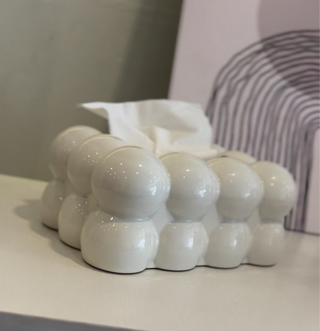 White aesthetic Bubble Tissue Box Holder (Category: Bathroom & Kitchen Fixtures) located in Marikina City. Submitted by lovegoeson (Listing ID 1466418713, Image 2). Description: - Material & Finish: Premium white ceramic with a sleek glossy finish - Design: Modern bubble ball pattern all around for a stylish look - Fit: Easily accommodates standard tissue packs - Build: Heavy and sturdy construction, ensuring it stays in place - Versatility: Clea