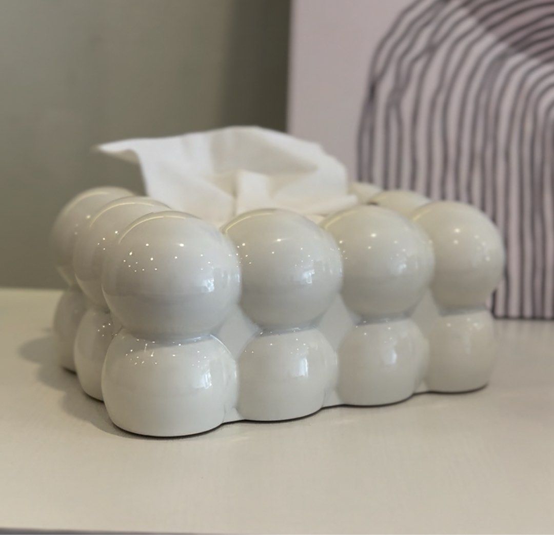White aesthetic Bubble Tissue Box Holder (Category: Bathroom & Kitchen Fixtures) located in Marikina City. Submitted by lovegoeson (Listing ID 1466418713, Image 1). Description: - Material & Finish: Premium white ceramic with a sleek glossy finish - Design: Modern bubble ball pattern all around for a stylish look - Fit: Easily accommodates standard tissue packs - Build: Heavy and sturdy construction, ensuring it stays in place - Versatility: Clea