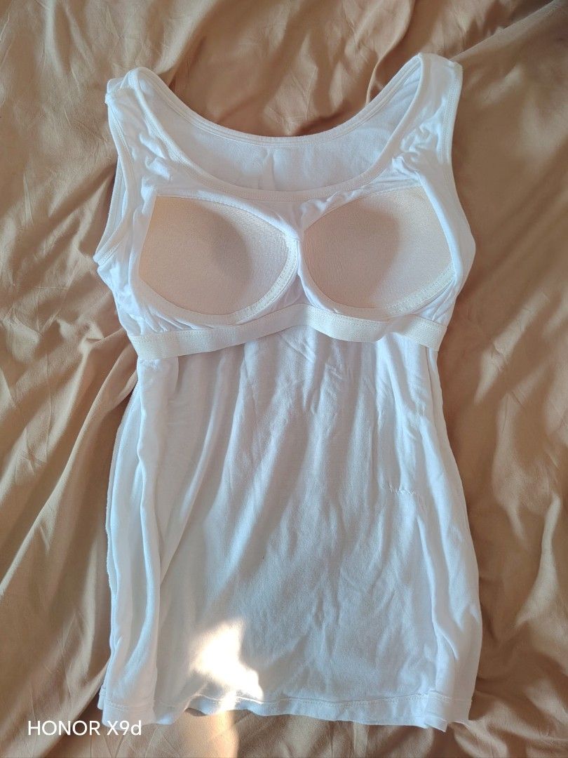 White Comfortable Pambahay with Built-in Bra Padding (Category: Sleeveless) located in Mabalacat. Submitted by Jackikay.PreLoved (Listing ID 1466434747, Image 2). Description: Perfect Pambahay! So comfy! - Size: S-M - Color: White - Features: Built-in padded cups (no bra needed!) - Material: Super soft and breathable cotton blend.