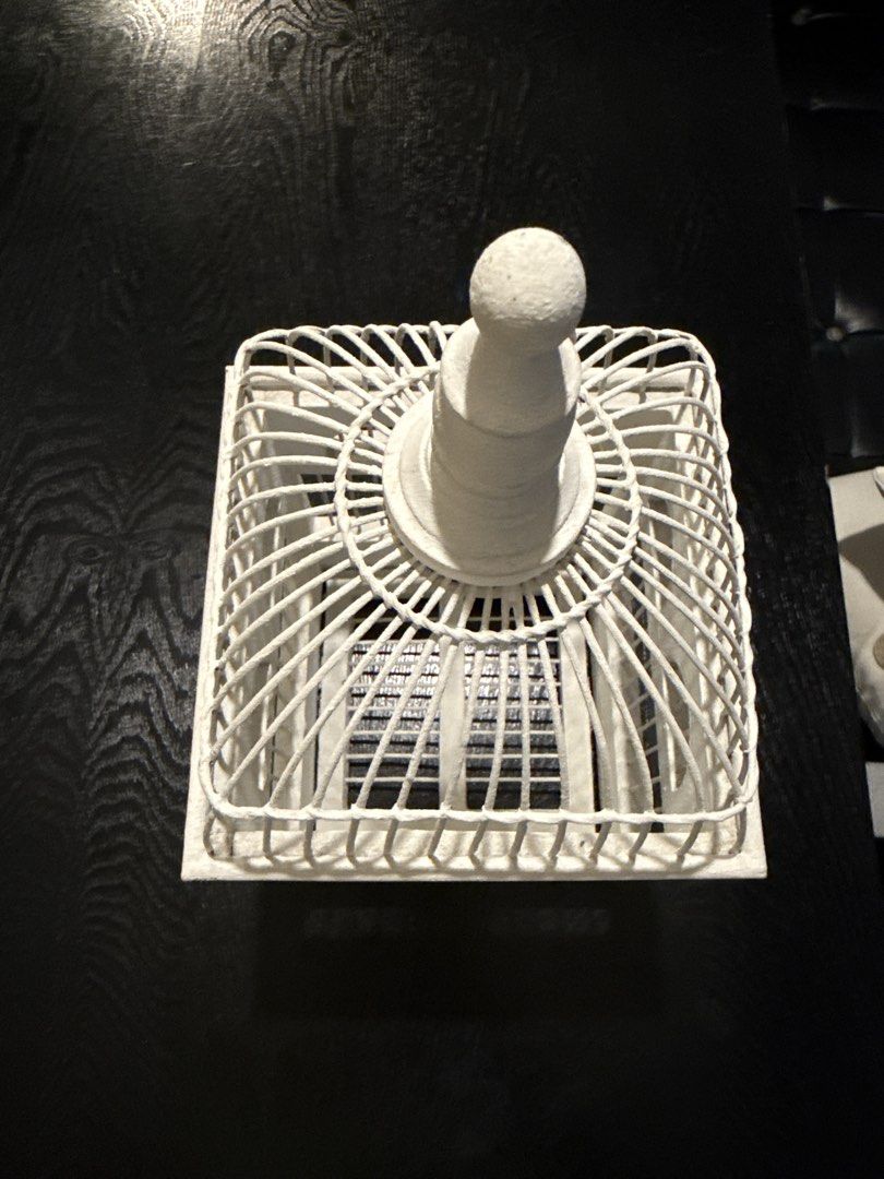 White Decorative Birdcage Home Decor Accent (Category: Vases & Decorative Bowls) located in Quezon City. Submitted by yourheaduhunter (Listing ID 1466098639, Image 3). Description: - Color: White with wooden base - Material: Metal wire dome top and solid construction - Design: Square shape with arched window details and four small feet - Versatility: Great accent piece for shelves, tabletops, or floral displays - Condition: Solid and painted fini