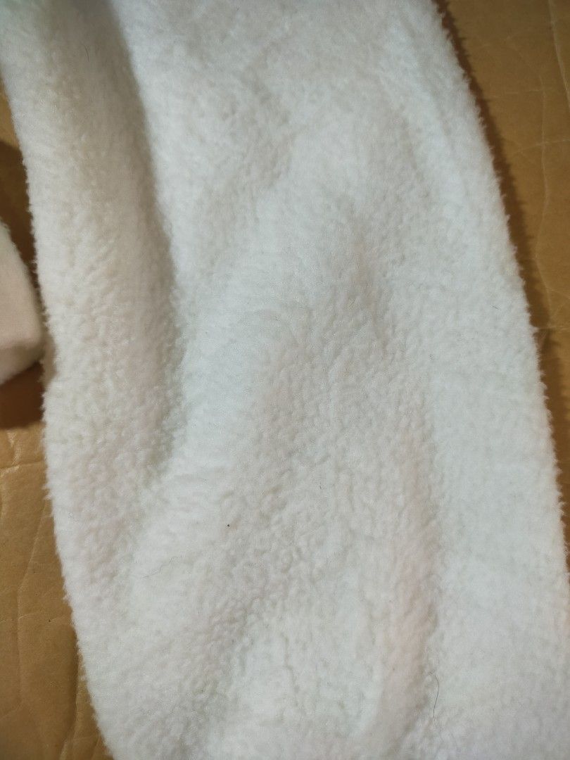 White Fuzzy Cropped Hoodie with Black Drawstrings jacket (Category: Coats, Jackets and Outerwear) located in Santo Tomas. Submitted by zenzenzennaya (Listing ID 1466377461, Image 3). Description: - Color: White - Material: Super soft fluffy fleece with smooth knit lining - Fit: Cropped length with ribbed hem and cuffs - Details: Contrast black drawstrings with metal tips, double-layered plush hood - Condition/Vibe: Great casual piece for cold day