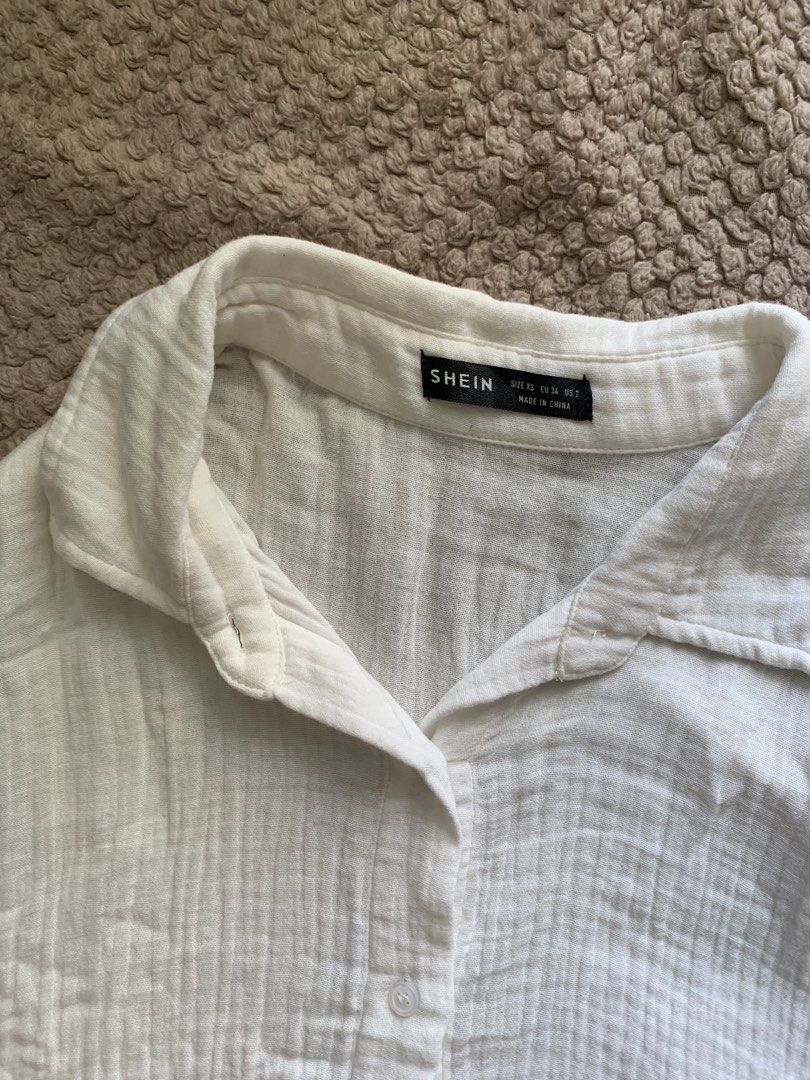 White Oversized Polo Top Longsleeves (Category: Longsleeves) located in Manila. Submitted by nuelaar (Listing ID 1466414007, Image 3). Description: size Small on tag - oversized can fit up to semi Large.