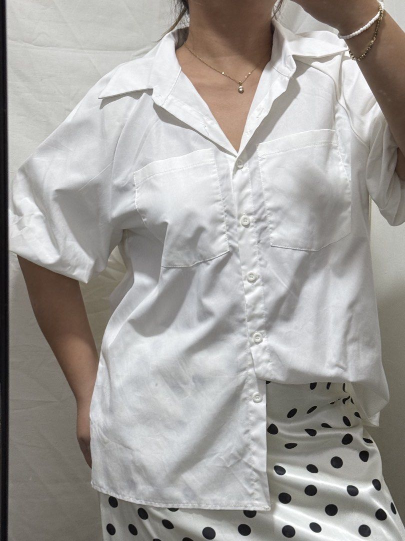 White puff polo top (Category: Blouses) located in Manila. Submitted by halsea (Listing ID 1466343585, Image 1). Description: large to xl.