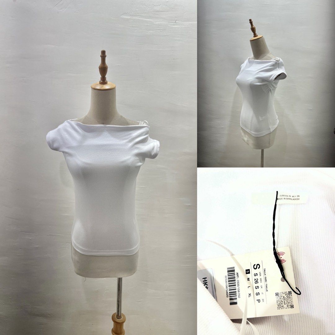 White ribbed off-shoulder top size S (Category: Sleeveless) located in Bacolod City. Submitted by bhabissagal-05763 (Listing ID 1466498525, Image 1). Description: - Style: Off-shoulder ribbed top with short sleeves - Fit: Slim fit silhouette - Size: S (tag attached) - Condition: Brand new with original store tags - Origin: Made in Bangladesh - Perfect for: Easy, stylish casual everyday wear.