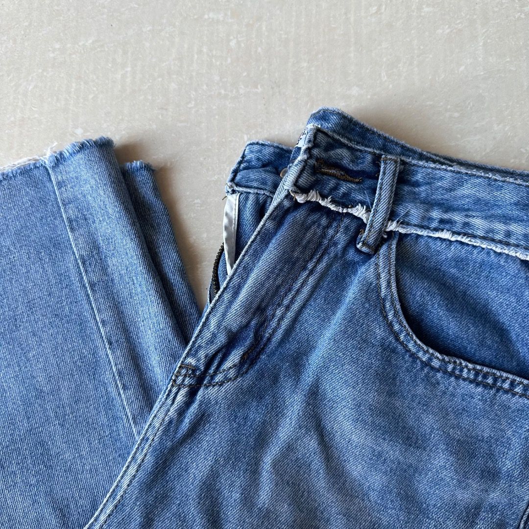 Wide Leg Denim Pants (Category: Jeans) located in Paranaque City. Submitted by yanie.ae (Listing ID 1466356472, Image 2). Description: fits 24-26 - Style: Straight cut jeans with a high waist fit - Details: Trendy raw frayed hem and light distressing on a clean wash - Features: Belt loops, zip fly, and standard front pockets - Origin: Imported from South Korea - Condition: Great quality, perfect for daily casual wear.