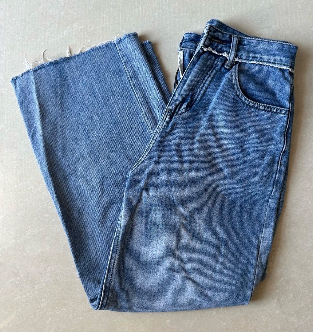 Wide Leg Denim Pants (Category: Jeans) located in Paranaque City. Submitted by yanie.ae (Listing ID 1466356472, Image 1). Description: fits 24-26 - Style: Straight cut jeans with a high waist fit - Details: Trendy raw frayed hem and light distressing on a clean wash - Features: Belt loops, zip fly, and standard front pockets - Origin: Imported from South Korea - Condition: Great quality, perfect for daily casual wear.
