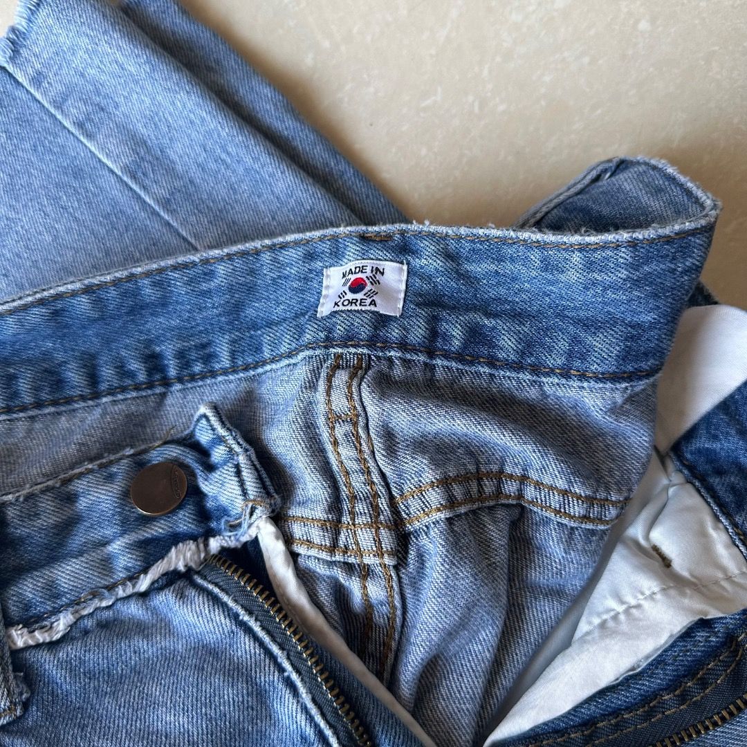 Wide Leg Denim Pants (Category: Jeans) located in Paranaque City. Submitted by yanie.ae (Listing ID 1466356472, Image 3). Description: fits 24-26 - Style: Straight cut jeans with a high waist fit - Details: Trendy raw frayed hem and light distressing on a clean wash - Features: Belt loops, zip fly, and standard front pockets - Origin: Imported from South Korea - Condition: Great quality, perfect for daily casual wear.