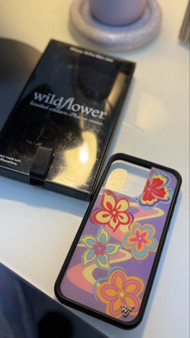 Wildflower Surf’s Up iPhone 15 Pro Max Case (Category: Cases & Sleeves) located in Antipolo. Submitted by lala.lysa (Listing ID 1466526079, Image 1). Description: Guaranteed authentic. Shows minor hairline scratches and signs of normal use..
