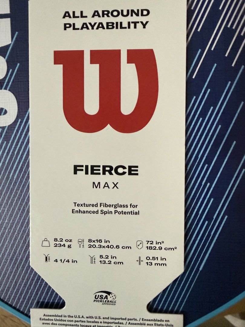 Wilson Fierce Max Pickleball Paddle (Category: Racket and Ball Sports) located in Quezon City. Submitted by jvr2019 (Listing ID 1466359203, Image 1). Description: - Brand: Wilson - Model: Fierce Max pickleball paddle - Condition: Brand new, unused with original cardboard hangtag still attached - Weight: 8.2 ounces - Surface: Textured fiberglass for enhanced spin - Core: Polypropylene honeycomb - Shape: Standard shape balancing power and control -