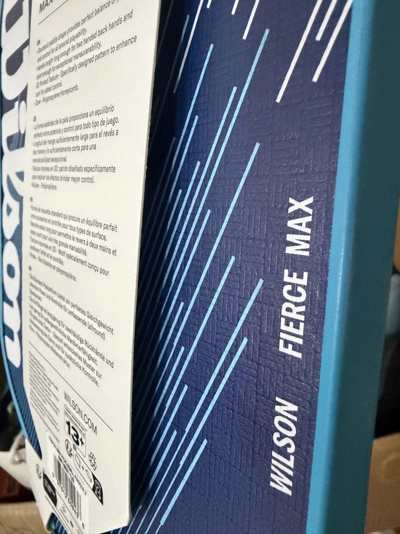 Wilson Fierce Max Pickleball Paddle (Category: Racket and Ball Sports) located in Quezon City. Submitted by jvr2019 (Listing ID 1466359203, Image 2). Description: - Brand: Wilson - Model: Fierce Max pickleball paddle - Condition: Brand new, unused with original cardboard hangtag still attached - Weight: 8.2 ounces - Surface: Textured fiberglass for enhanced spin - Core: Polypropylene honeycomb - Shape: Standard shape balancing power and control -
