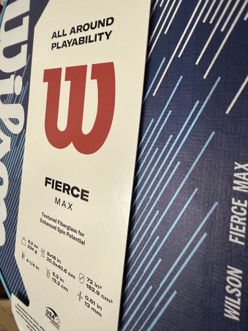 Wilson Fierce Max Pickleball Paddle (Category: Racket and Ball Sports) located in Quezon City. Submitted by jvr2019 (Listing ID 1466359203, Image 3). Description: - Brand: Wilson - Model: Fierce Max pickleball paddle - Condition: Brand new, unused with original cardboard hangtag still attached - Weight: 8.2 ounces - Surface: Textured fiberglass for enhanced spin - Core: Polypropylene honeycomb - Shape: Standard shape balancing power and control -