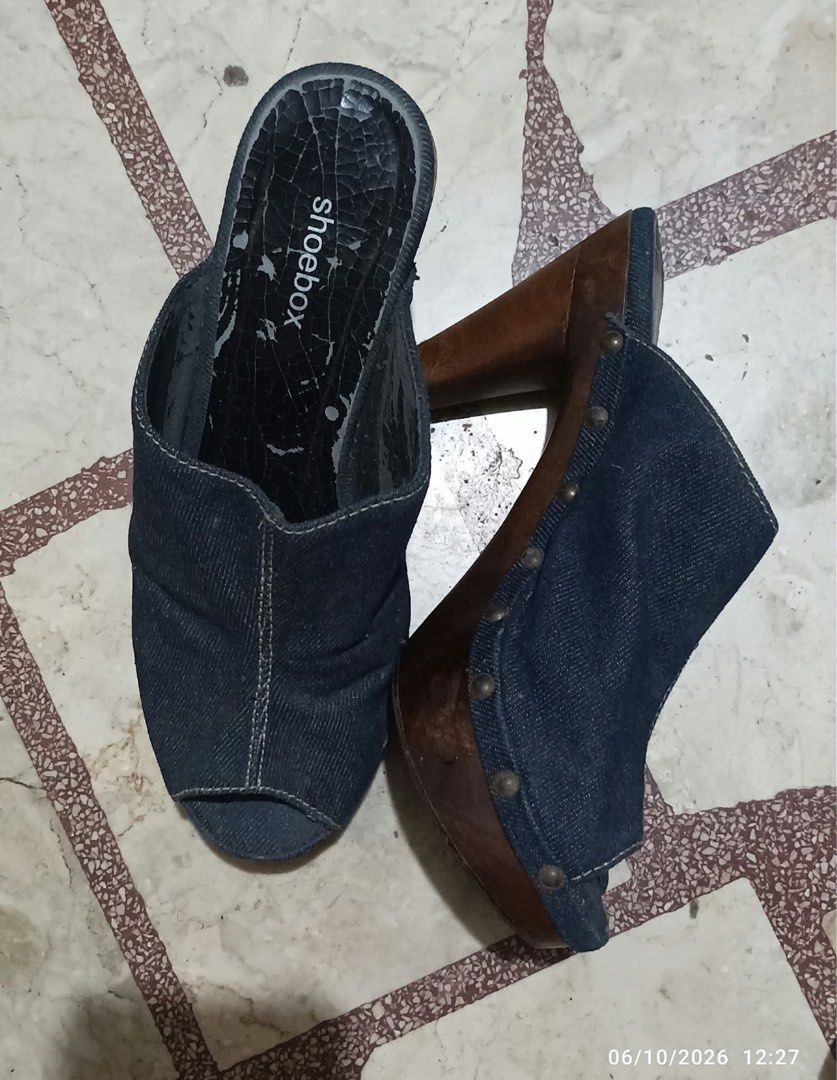 Women’s Wedge Slide/Clog (Category: Flats & Sandals) located in Taytay. Submitted by crisha14344 (Listing ID 1466380095, Image 2). Description: Denim fabric upper (dark blue jeans-like material) Open toe design at the front Slip-on style with no straps or laces Wood-look wedge heel/platform Decorative metal studs/rivets Na-stock lang po yan Kayo nalang mag-price Decluttering Size nyan mga 6.5 to 7.