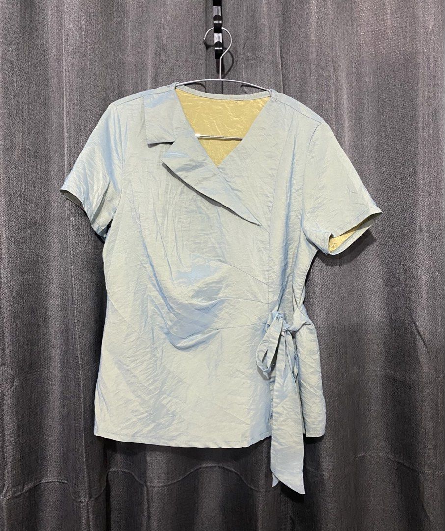 Wrap style Top (Category: Others Tops) located in Mandaluyong City. Submitted by aiztyle (Listing ID 1466381954, Image 1). Description: Wrap style top Best fit Medium Measurement: Bust 19.5” Length 24” SALE Php150.00 only.