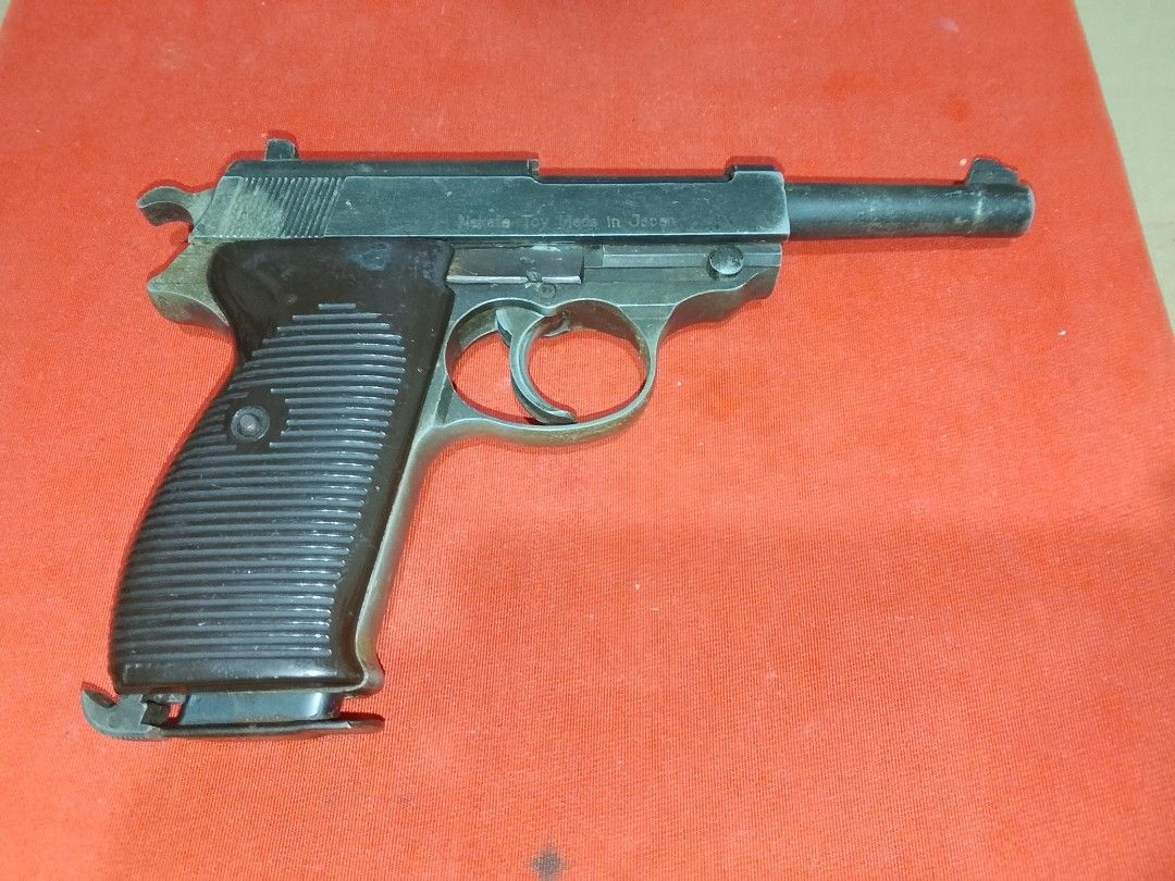 WWII Replica/Toy P38 (Category: Vintage Collectibles) located in Santo Tomas. Submitted by retrotastic (Listing ID 1466358689, Image 1). Description: Nakata Japan, feels at weighs like the real one. made of Heavy metal. very old so as is. highly collectible with freebies ✔️ Original Nakata Japan🇯🇵.