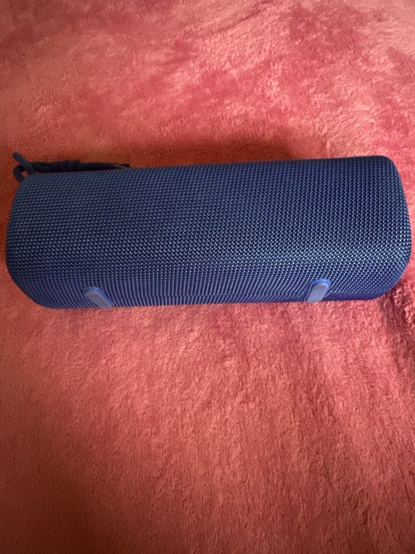 Xiaomi Mi Bluetooth Speaker Blue Portable Audio (Category: Soundbars, Speakers & Amplifiers) located in Quezon City. Submitted by daniellenavarrete0720 (Listing ID 1466386773, Image 2). Description: - Brand: Xiaomi - Color: Blue - Design: Stylish fabric mesh body with rubberized buttons and anti-slip feet - Controls: Easy-to-use top buttons for power, volume, play/pause, Bluetooth pairing, and connection - Portability: Includes an attached blue c