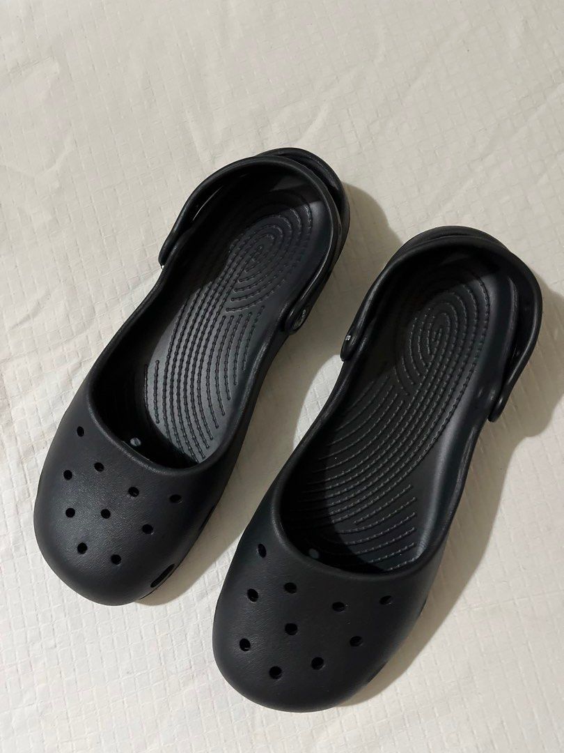 xiicro Black Clogs Shoes Size 41 (Category: Flats & Sandals) located in Quezon City. Submitted by getitrightaway.ph (Listing ID 1466071079, Image 1). Description: - Brand: Xiicro - Size: 41 (Men's/Unisex) - Color: Classic Black - Style: Slip-on clogs with breathable ventilation holes - Features: Adjustable heel strap with embossed branding, textured footbed for anti-slip grip, and durable rubber outsole with deep tread - Weight: Super lightweight