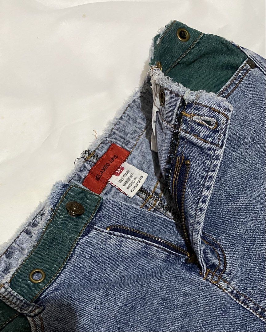 Y2K DECONSTRUCTED DENIM SLIT SKIRT (Category: Skirts) located in Pasig City. Submitted by thriftbycelle (Listing ID 1466398207, Image 2). Description: features a front slit, a raw-edge frayed waist, and a forest green contrast inner waistband with snap button detailing. heavy 100% cotton construction for that structured Y2K fit. 𐙚 Brand: Relaxed Jeans 𐙚 Size: Tagged Medium (M) — DM for flat waist & length measurements! 𐙚 Condition: 9/10 (clean