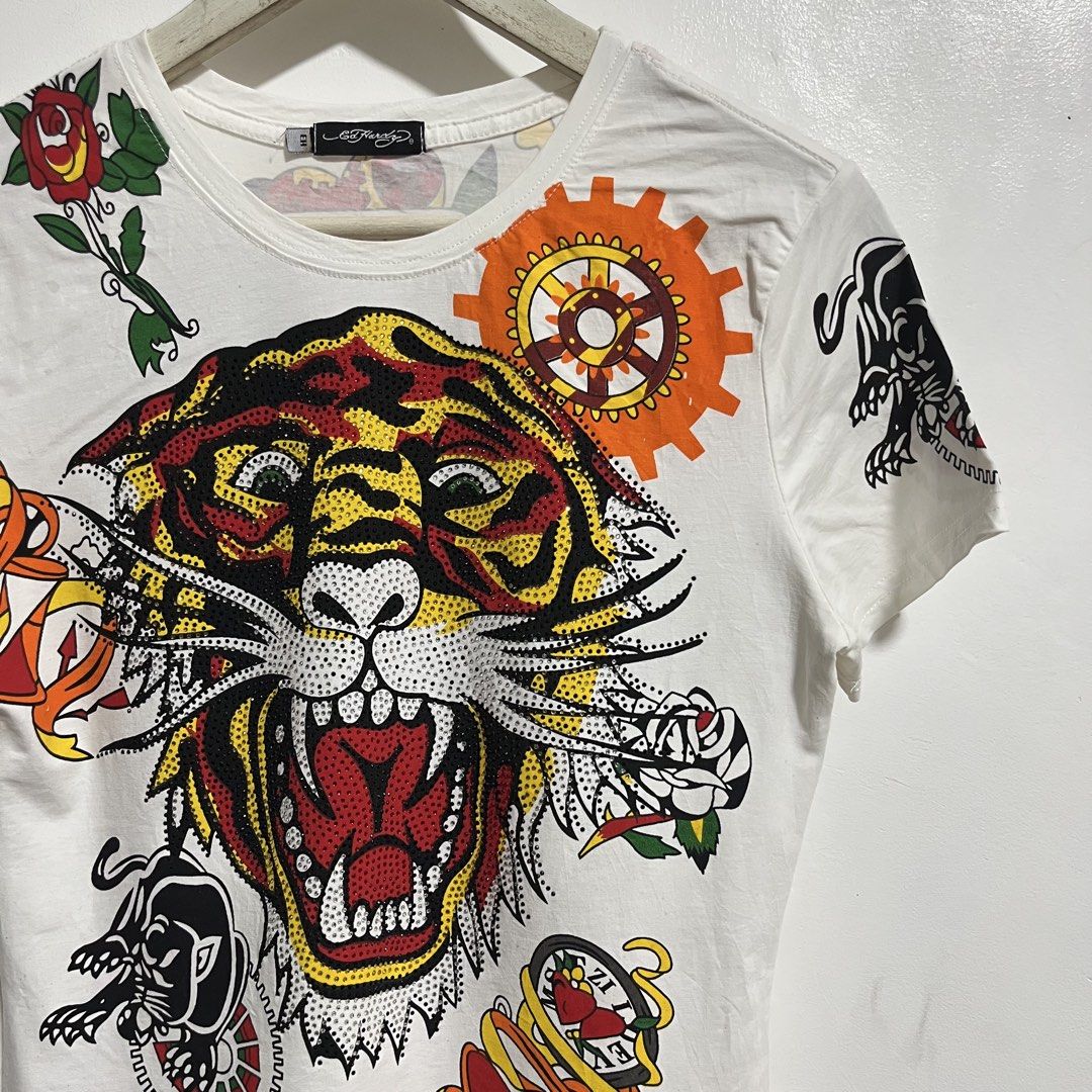 Y2K ED-HARDY AOP TEE (Category: Shirts) located in Manila. Submitted by balanse (Listing ID 1466387633, Image 3). Description: SIZE: S-M ON TAG DIMES: 17W X 25L EXCELLENT CONDITION 9.9 HONEST COLOR RATE. MINOR MISSING RHINESTONE .