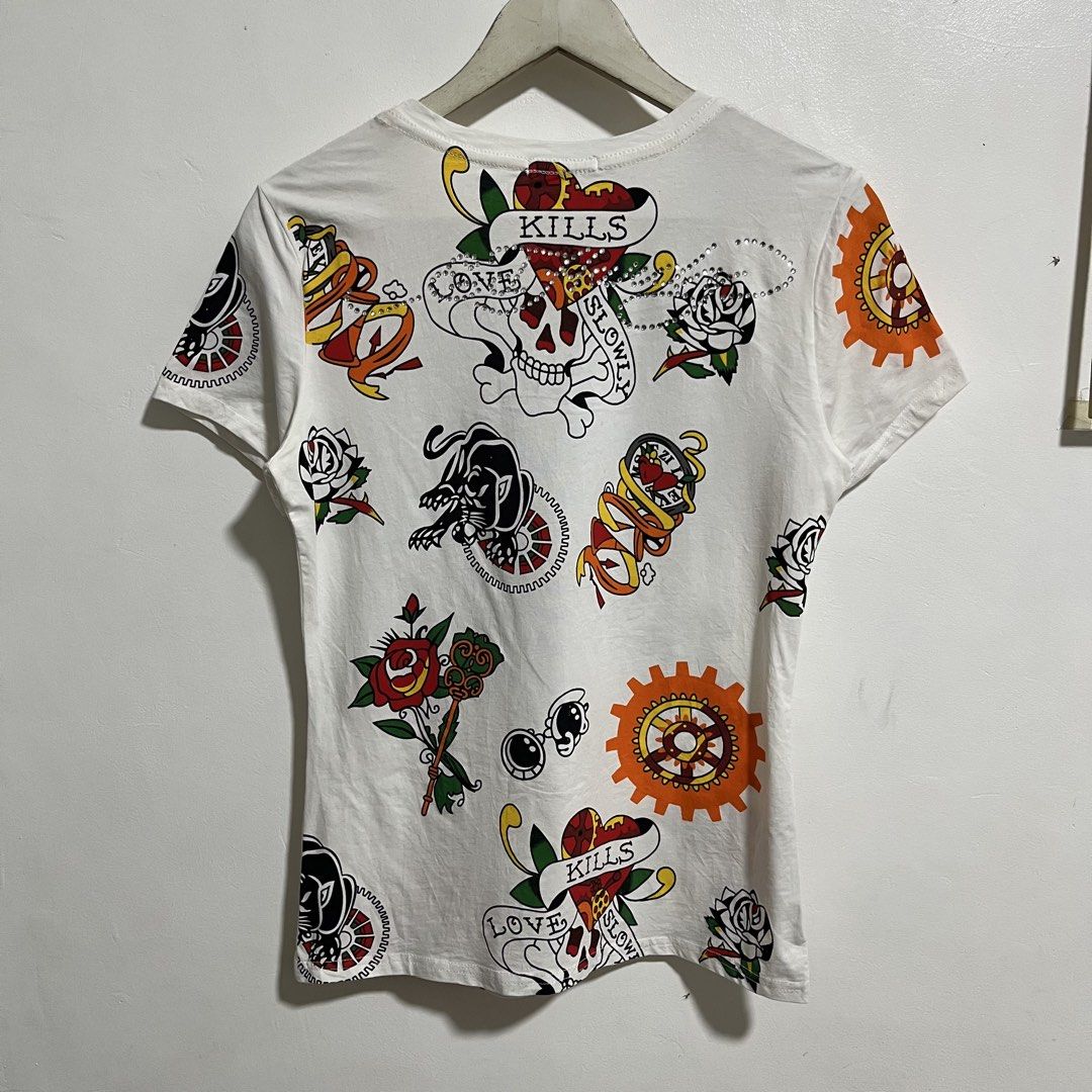 Y2K ED-HARDY AOP TEE (Category: Shirts) located in Manila. Submitted by balanse (Listing ID 1466387633, Image 2). Description: SIZE: S-M ON TAG DIMES: 17W X 25L EXCELLENT CONDITION 9.9 HONEST COLOR RATE. MINOR MISSING RHINESTONE .