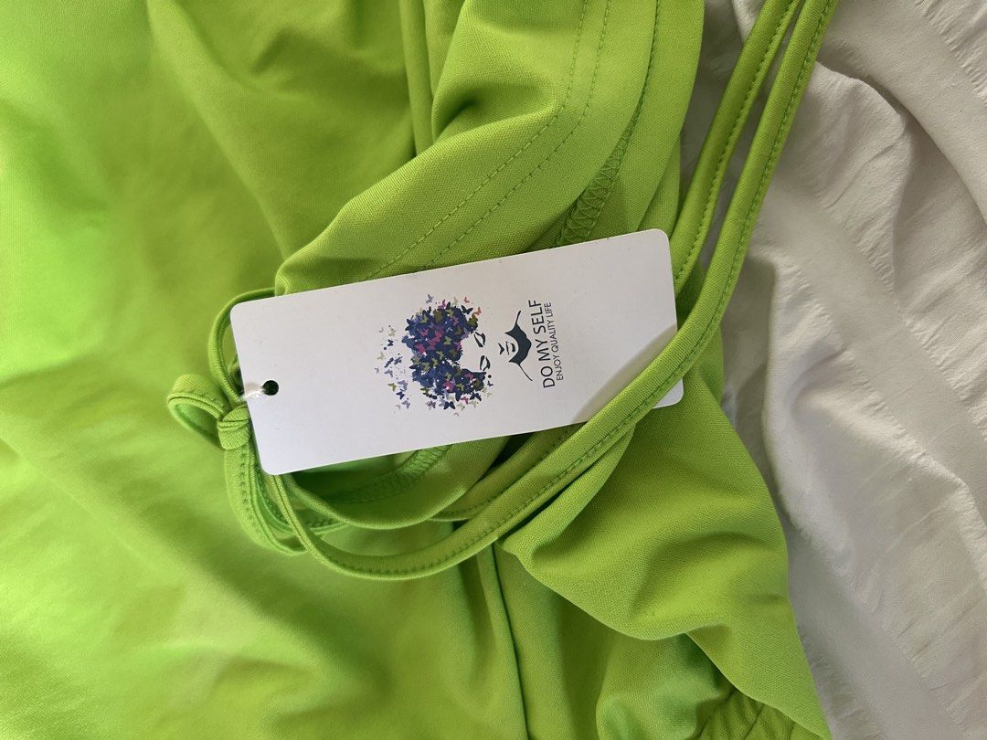 Y2k Lime Green Ruched Chain Dress (Category: Dresses) located in Mandaluyong City. Submitted by youarecutejeans (Listing ID 1466441650, Image 2). Description: - Brand: Do My Self (Brand New with Tag) - Color: Bright lime green - Fit: Bodycon with stretchy fabric - Details: Side ruching, adjustable drawstrings, and silver chain halter neck - Condition: Brand new, never worn.