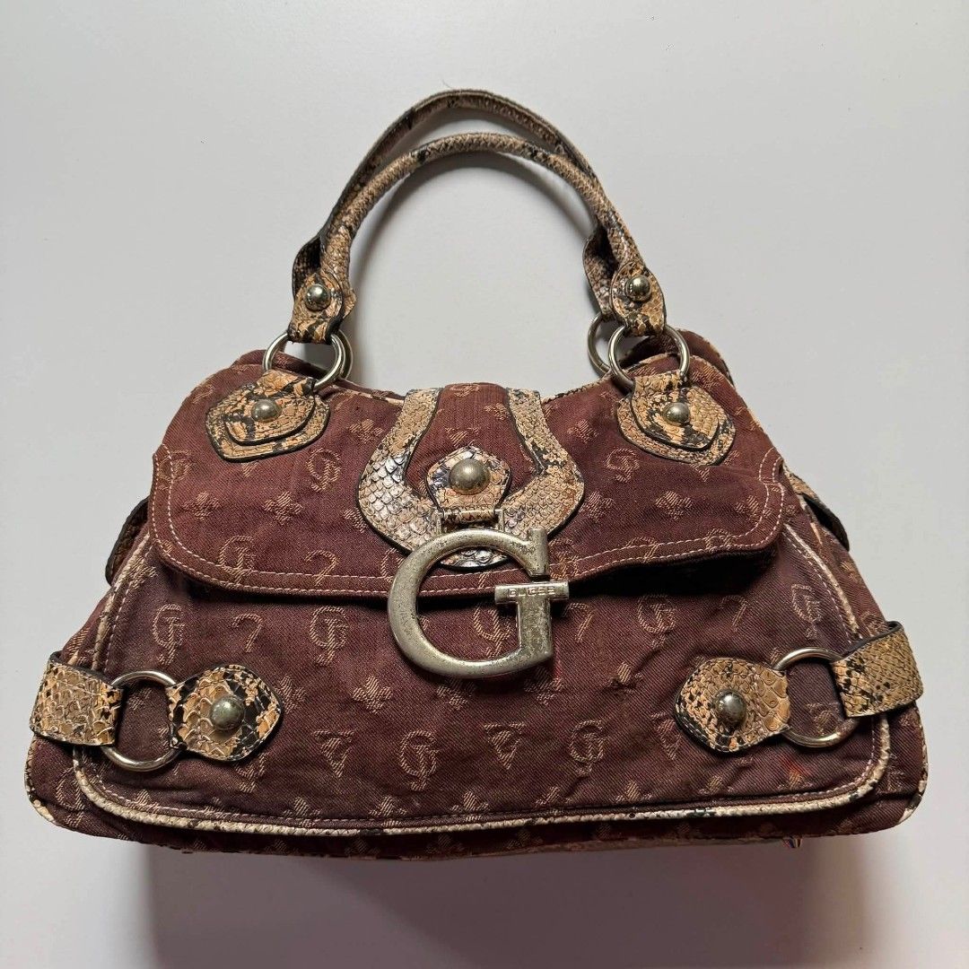 Y2K Vintage Guess bag python (Category: Shoulder Bags) located in Aloran. Submitted by vintgbags (Listing ID 1466435004, Image 1). Description: All details are posted Condition is Good. Open for negotiable sent your offer..