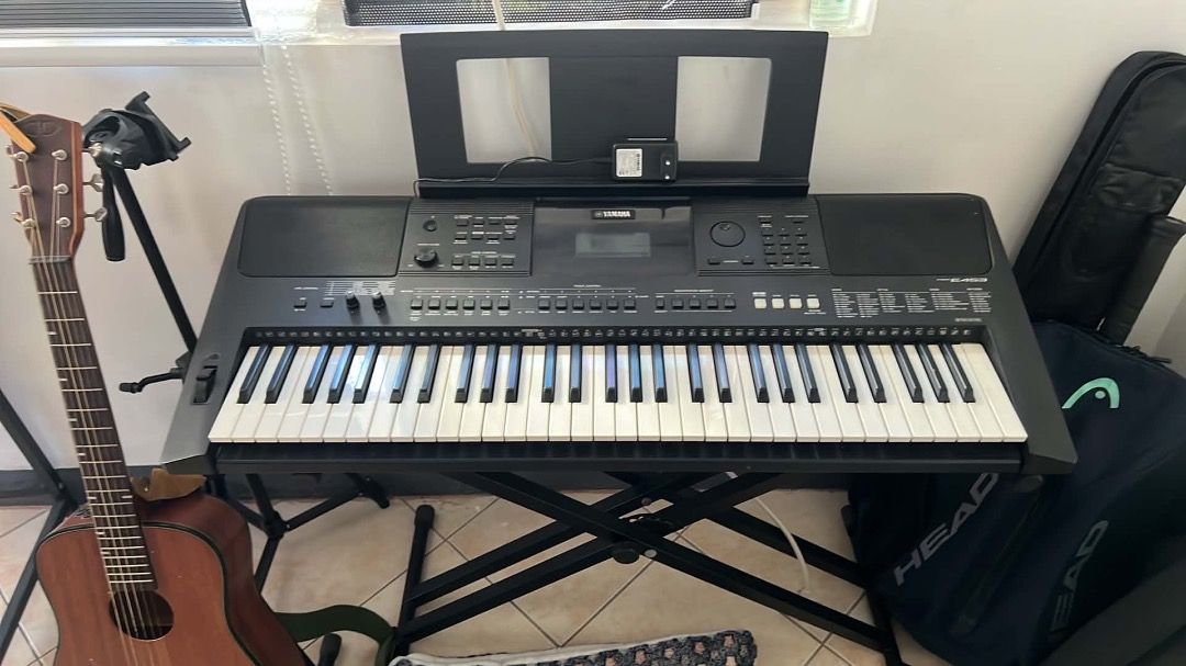 Yamaha PSR-E463 Portable Keyboard with Stand (Category: Musical Instruments) located in Valenzuela. Submitted by rmbernardo (Listing ID 1466337099, Image 3). Description: YAMAHA PSR E-453 All keys are still functional — slight hard touch for assign button With keyboard stand and original AC Adaptor Price is slightly negotiable RFS: No longer used (owner’s hobby), need funds - Yamaha portable keyboard in sleek black finish - 61 touch-sensitive key