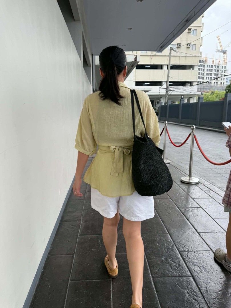 Yellow Cold Shoulder Button-Down Blouse With Tie Belt (Category: Blouses) located in Quezon City. Submitted by timelesstreasure117 (Listing ID 1465553718, Image 2). Description: Can fit from medium to large Good condition ₱50 Bundle with my other top listings to get discount Buyer books courier of choice Payment via gcash or paymaya.