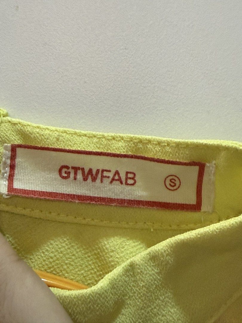 Yellow cropped high neck top (Category: Blouses) located in Quezon City. Submitted by hazpreloved (Listing ID 1466417894, Image 3). Description: GTW Fab Yellow cropped high neck top Size S Discounts for bulk orders Tags: shein, mango, pull & bear, h&m, cotton on.