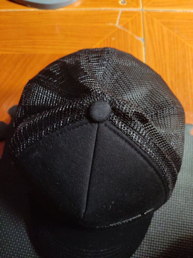 Yohji Yamamoto Black Trucker Cap (Category: Caps & Hats) located in Caloocan City. Submitted by neweagle-424b (Listing ID 1466390738, Image 3). Description: - Brand: Yohji Yamamoto (Coverbrain tag) - Color: Classic all-black - Design: Embroidered Yohji signature on structured front crown, curved brim - Material: 60% cotton, 40% polyester - Back: Breathable mesh panels with adjustable matching black snapback closure - Fit: Standard adult sizing.