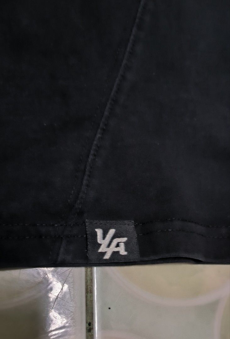 YoungLA Black T-Shirt (Category: Tshirts & Polo Shirts ) located in Manila. Submitted by itsmelawrence (Listing ID 1466359046, Image 2). Description: - Brand: YoungLA - Color: Black 9.2/10 - Size: Small (S) 21x28 - Design: Tonal embroidered YoungLA logo on chest with small YLA hem tag - Details: Interior printed neck label with Los Angeles branding and website - Versatile: Perfect for workouts or everyday casual wear - Condition: Brand new / Exce