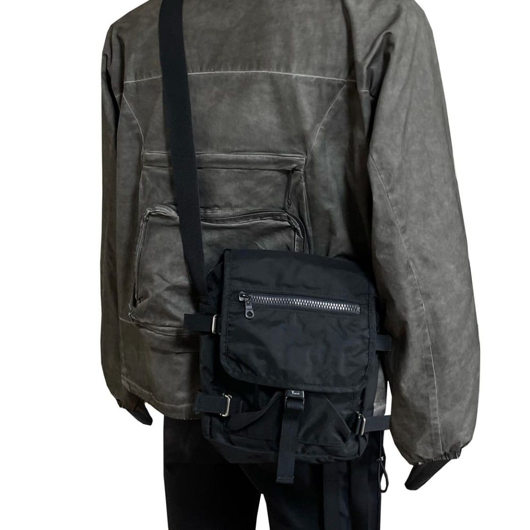 Ysacs Slingbag (Category: Sling Bags) located in Lipa City. Submitted by gudoys_outdoor16 (Listing ID 1466468460, Image 1). Description: - Color: Sleek Black - Material: Durable, high-quality nylon - Style: Tactical utility crossbody bag - Strap: Adjustable for a custom fit - Pockets: Front flap pocket with top zipper compartment - Closure: Secure buckle main compartment - Extras: Multiple side strap details for a rugged look - Size: Compact and 