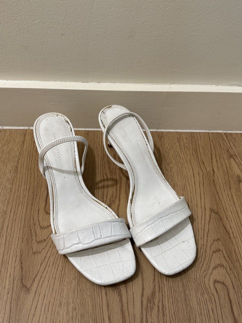 Zara Basic White Croc Embossed Heeled Sandals (Category: Heels) located in Paranaque City. Submitted by vjau_ (Listing ID 1466364924, Image 1). Description: Well-loved Zara white leather heels. With signs of use but can be cleaned. One of my favorite pairs but need to declutter. .