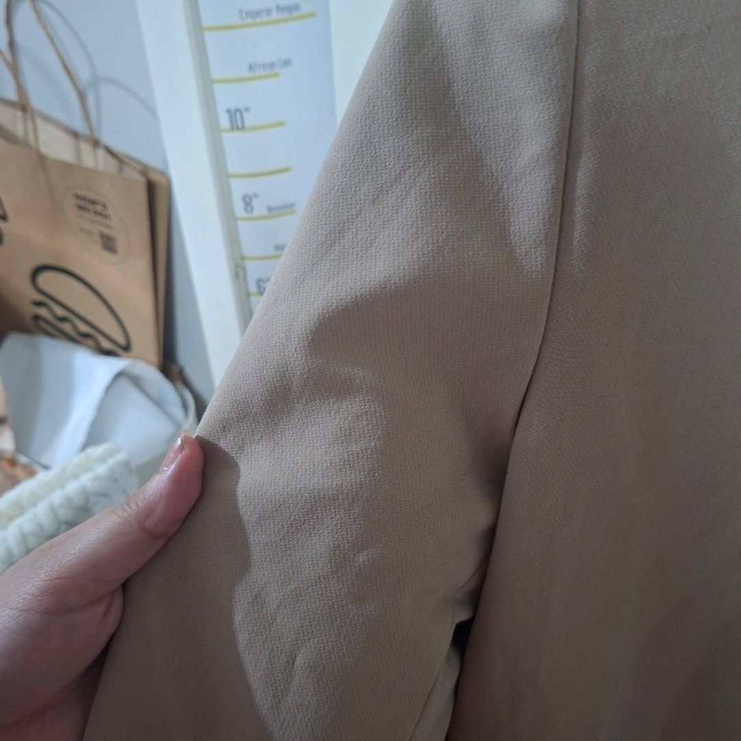 Zara Beige Double Breasted Blazer Size L (Category: Coats, Jackets and Outerwear) located in Quezon City. Submitted by arargarcia (Listing ID 1466460021, Image 3). Description: - Brand: Zara - Color: Beige - Size: L - Material/Origin: Made in Vietnam with clean, smooth fabric - Design: Double-breasted front with two black buttons - Details: Long sleeves, structured shoulders, and flap pockets on both sides - Lining: Black inner lining - Condition