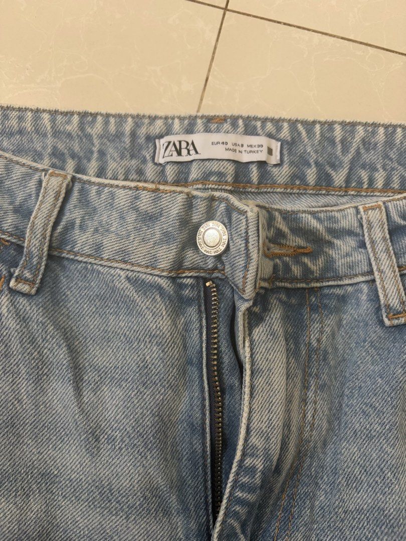 ZARA Denim Pants (Category: Jeans) located in Las Pinas. Submitted by bibliomomma (Listing ID 1466396013, Image 2). Description: Zara denim pants, size US 8. Light wash with a relaxed, wide-leg fit. Good preloved condition with raw/frayed hem detail. Perfect for casual everyday wear Size 15.5 inches when laid flat Length 41 inches Size US 8 on tag No photo when worn MOP Gcash.