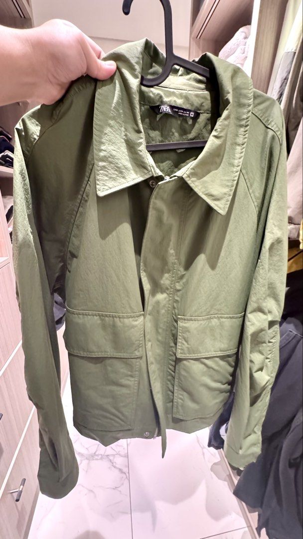 Zara Green Jacket Size M (Category: Coats, Jackets and Outerwear) located in Quezon City. Submitted by helloimcharles (Listing ID 1466460943, Image 1). Description: - Brand/Item: Zara Green Utility Jacket - Size: Medium (M) - Closure: Full zip front with button details - Pockets: Two functional front utility pockets - Fabric: Lightweight material, perfect for casual days - Condition: Clean overall.