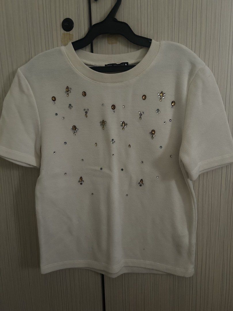 Zara rhinestone embellished top (Category: Shirts) located in Manila. Submitted by jellyblly (Listing ID 1466383536, Image 1). Description: i love love this top so flattering and classy size:small loc:mnl.
