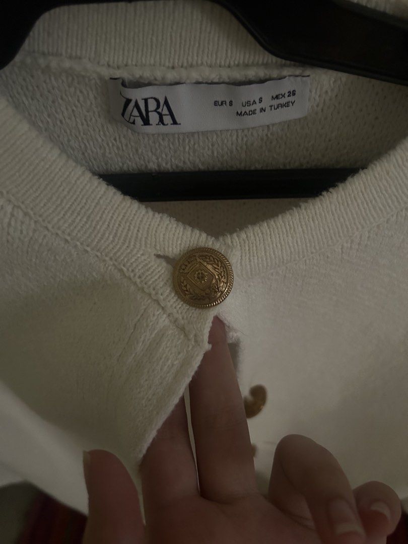 Zara white cardigan (Category: Others Tops) located in Manila. Submitted by jellyblly (Listing ID 1466383279, Image 2). Description: zara white cardigan with gold buttons size:small loc:mnl.