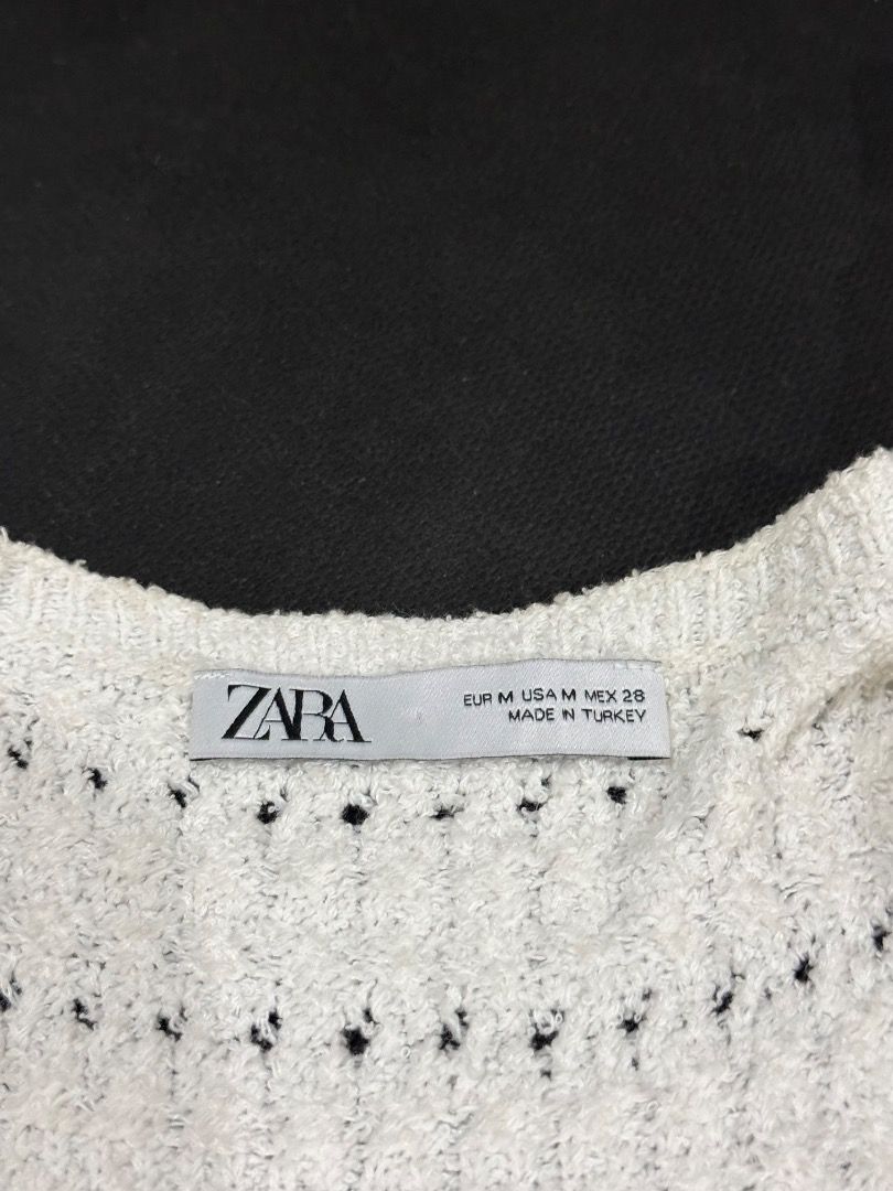 Zara White Knit Square Neck Crop Top (Category: Sleeveless) located in Manila. Submitted by caeln (Listing ID 1466524741, Image 3). Description: - Brand: Zara - Style: White knit crop top with square neckline and puff sleeves - Details: Textured pattern across the body - Size: M - Condition: Worn a couple of times, still in great shape.
