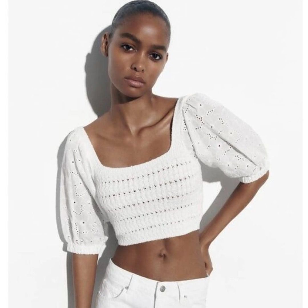 Zara White Knit Square Neck Crop Top (Category: Sleeveless) located in Manila. Submitted by caeln (Listing ID 1466524741, Image 1). Description: - Brand: Zara - Style: White knit crop top with square neckline and puff sleeves - Details: Textured pattern across the body - Size: M - Condition: Worn a couple of times, still in great shape.