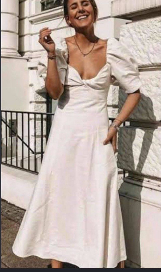 Zara White Linen Knot Rustic Puff Dress (Category: Dresses) located in Mandaluyong City. Submitted by drpshop (Listing ID 1466440182, Image 2). Description: Mint condition, no flaws. Small on tag fits up to semi medium . Last photo is the actual when worn photo. First to pay basis!.