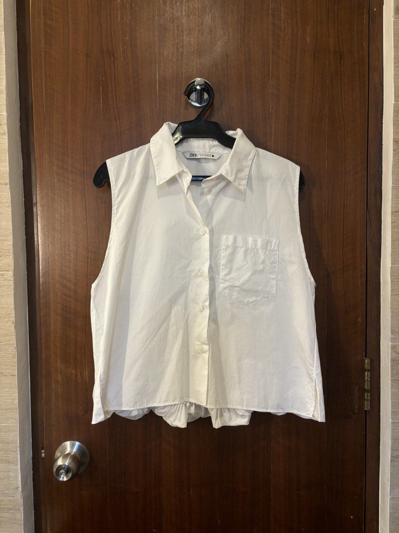 Zara White Sleeveless Button-Up Blouse (Category: Sleeveless) located in Muntinlupa City. Submitted by juliegarcia (Listing ID 1466440992, Image 1). Description: 🚢 Shipping fee not included. 💸 Price negotiable. 💌 DM for more photos & info. .