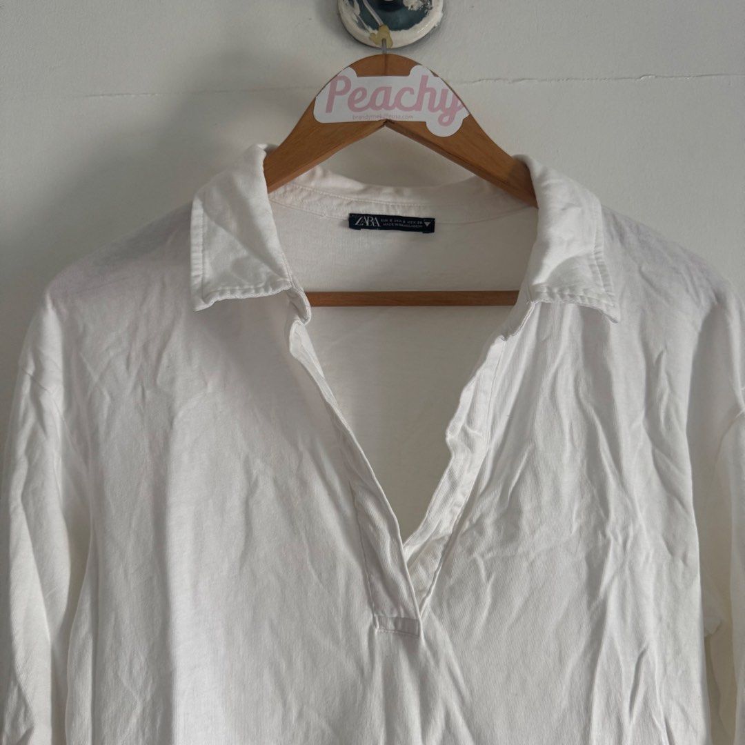 Zara white top (Category: Blouses) located in Manila. Submitted by apparella.ph (Listing ID 1466415519, Image 2). Description: 10/10 condition never worn na stock lng sa cabinet Super ganda and comfy/ soft knitted Bust: 38 Length:25 ☑️Everything is my Own preloved / BNWT/BNWOT ☑️ not thrifted/Ukay ☑️ malukot sa picture kasi na stock sa cabinet (tinatamad mag plantsa ✌️ ) ☑️Personal items ( usually bought in US/UK/JPN ) every year po ako nag aabro