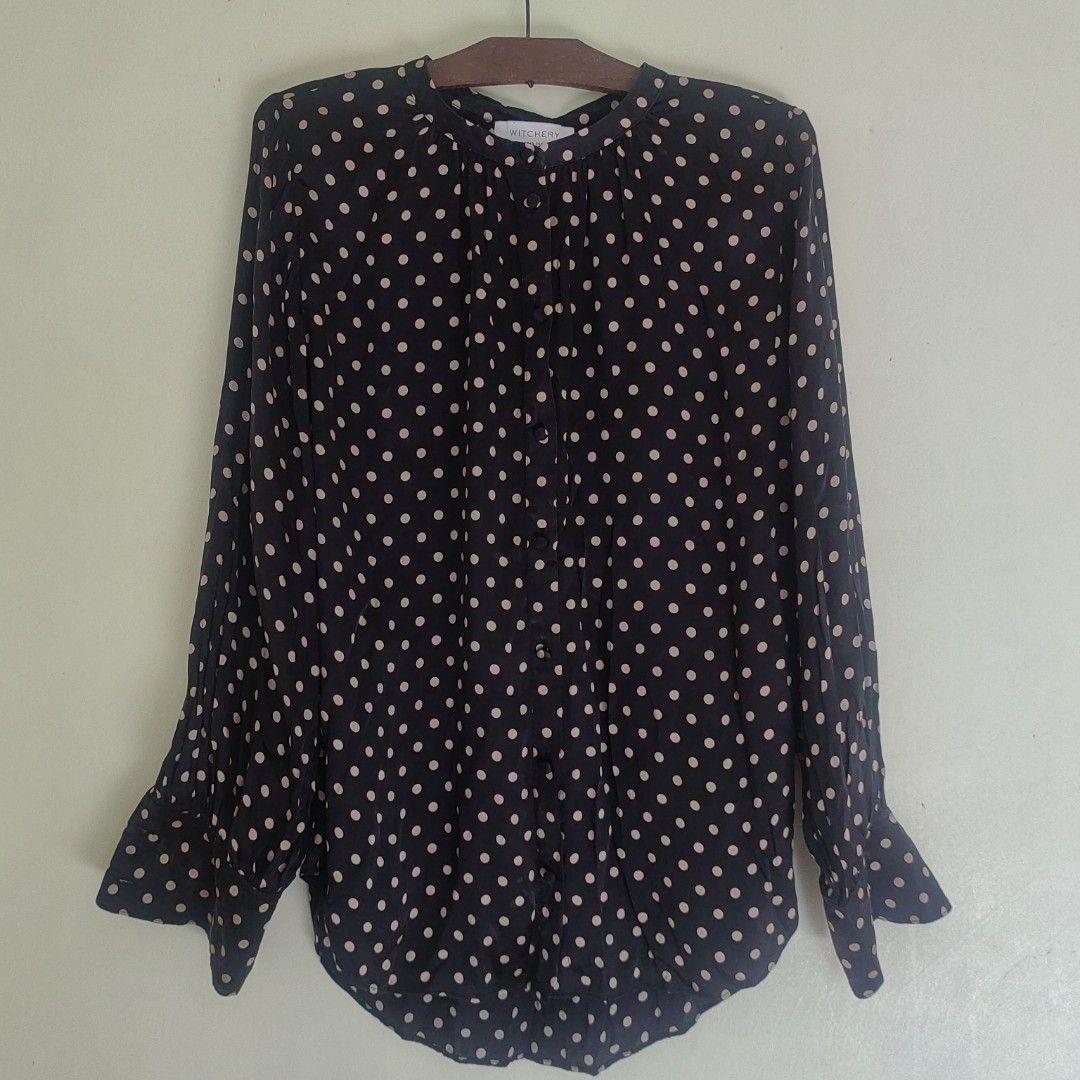 100% Silk Polka Dot Button Down Longsleeve Blouse 'Witchery Silk Blouse' (Category: Longsleeves) located in Barotac Nuevo. Submitted by yorcollections (Listing ID 1466688470, Image 3). Description: 100% Silk Polka Dot Button Down Longsleeve Blouse classic black silk fabric and white all over polka dot print, button front placket and soft gathered collar very airy and comfortable Size 10 on tag Length 26 inches Width 23 inches Sleeve length 23.5 i