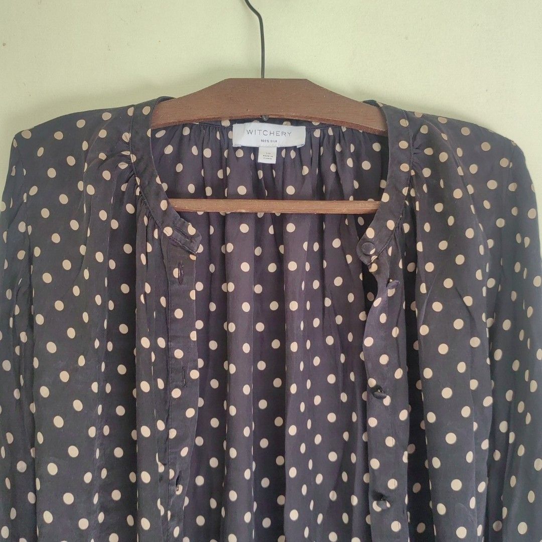100% Silk Polka Dot Button Down Longsleeve Blouse 'Witchery Silk Blouse' (Category: Longsleeves) located in Barotac Nuevo. Submitted by yorcollections (Listing ID 1466688470, Image 2). Description: 100% Silk Polka Dot Button Down Longsleeve Blouse classic black silk fabric and white all over polka dot print, button front placket and soft gathered collar very airy and comfortable Size 10 on tag Length 26 inches Width 23 inches Sleeve length 23.5 i