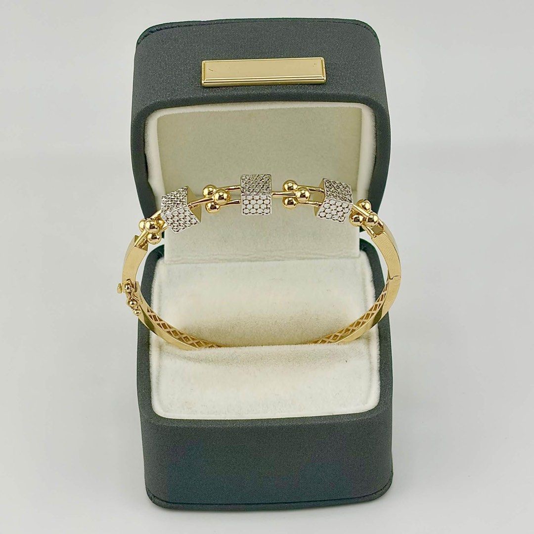 18k Saudi Gold Two Toned Bangle (Category: Bracelets) located in Cabuyao City. Submitted by whatellawore (Listing ID 1466600846, Image 2). Description: size 16cm 10.7g for shipping ONLY buyer will shoulder shipping fee.