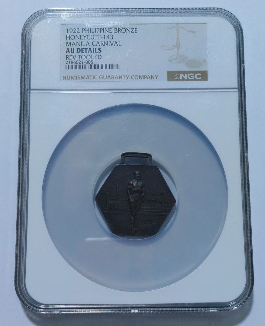 1922 Manila Carnival Interscholastic (Category: Currency) located in Taguig. Submitted by ezekiel103 (Listing ID 1466596324, Image 3). Description: - Item: 1922 Manila Carnival Bronze Medal (Honeycutt-143) - Grading: NGC AU Details Rev Tooled (Cert #2186021-005) - Obverse: Classic athlete design - Reverse: Hand-engraved 'Interscholastic Meet', '1 Mile Relay', 'Third', and 'East Visayan' - Maker Mark: Crispulo Zamora at the bottom - Condition: Enc