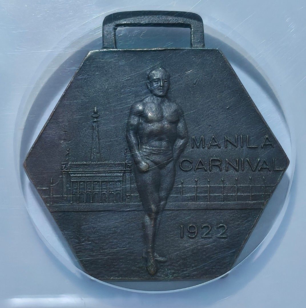1922 Manila Carnival Interscholastic (Category: Currency) located in Taguig. Submitted by ezekiel103 (Listing ID 1466596324, Image 1). Description: - Item: 1922 Manila Carnival Bronze Medal (Honeycutt-143) - Grading: NGC AU Details Rev Tooled (Cert #2186021-005) - Obverse: Classic athlete design - Reverse: Hand-engraved 'Interscholastic Meet', '1 Mile Relay', 'Third', and 'East Visayan' - Maker Mark: Crispulo Zamora at the bottom - Condition: Enc