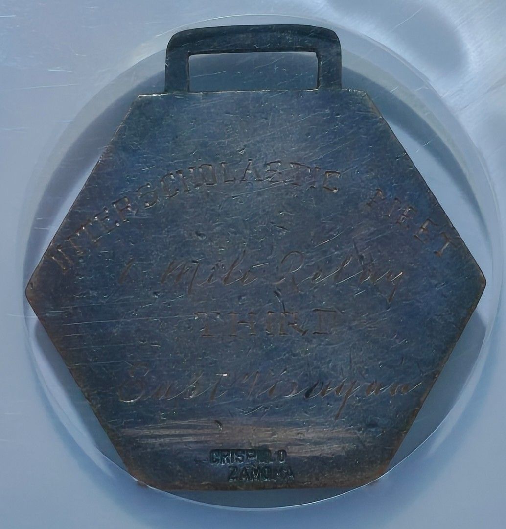 1922 Manila Carnival Interscholastic (Category: Currency) located in Taguig. Submitted by ezekiel103 (Listing ID 1466596324, Image 2). Description: - Item: 1922 Manila Carnival Bronze Medal (Honeycutt-143) - Grading: NGC AU Details Rev Tooled (Cert #2186021-005) - Obverse: Classic athlete design - Reverse: Hand-engraved 'Interscholastic Meet', '1 Mile Relay', 'Third', and 'East Visayan' - Maker Mark: Crispulo Zamora at the bottom - Condition: Enc